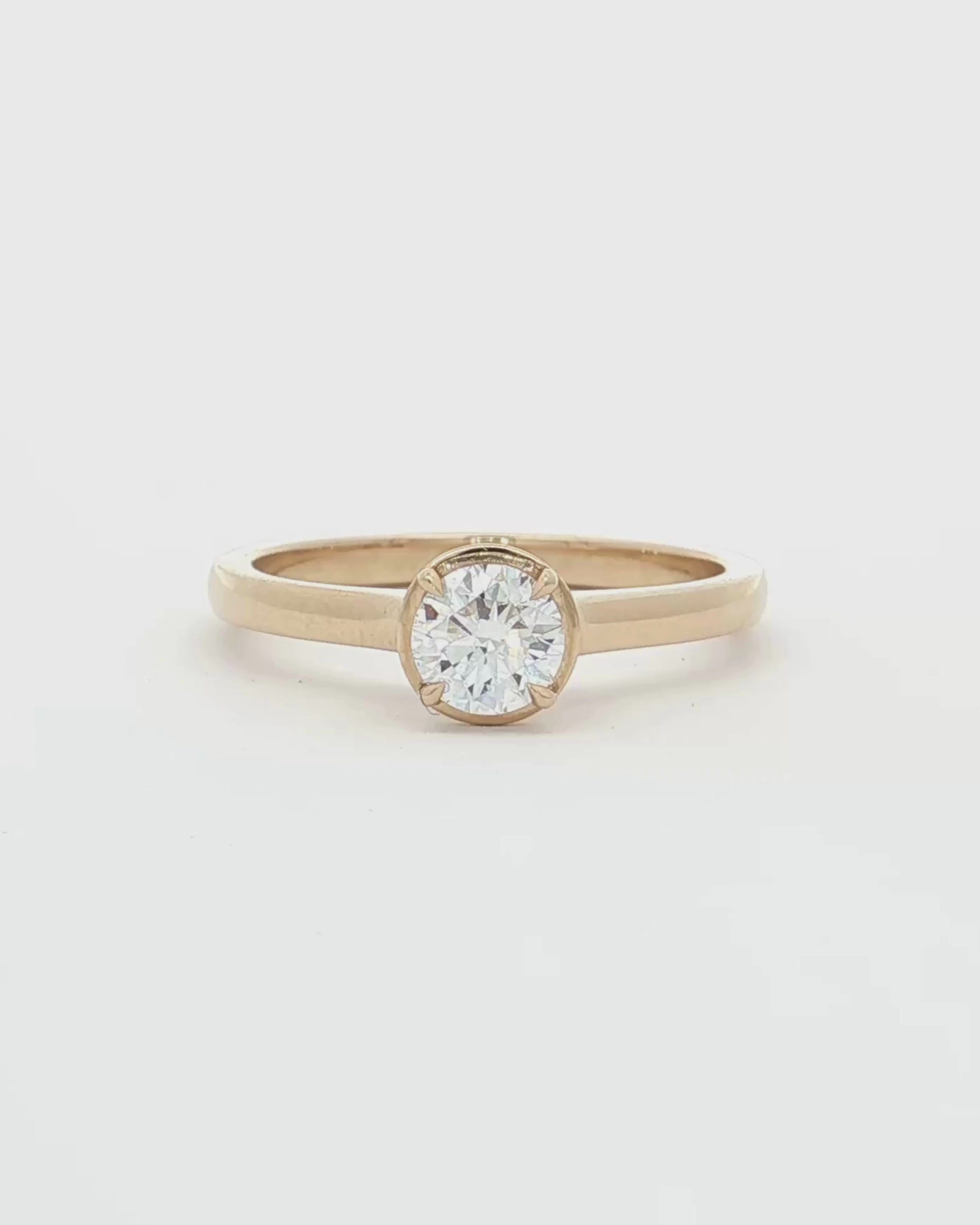 360 video of 0.5ct Lab Grown Diamond Halo Ring with 9 Ct solid gold band on white background