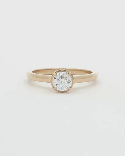 360 video of 0.5ct Lab Grown Diamond Halo Ring with 9 Ct solid gold band on white background