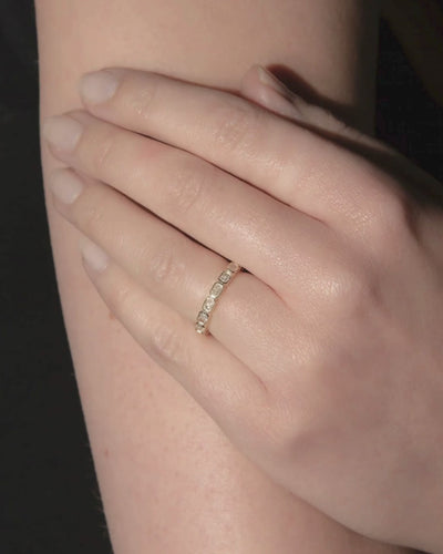 9ct Yellow Gold East-West Bezel Diamond Eternity Ring on model 