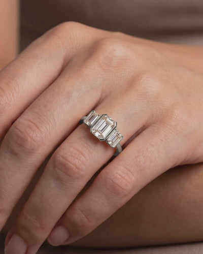 Platinum Emerald Cut Lab Grown Diamond Trilogy Ring on model