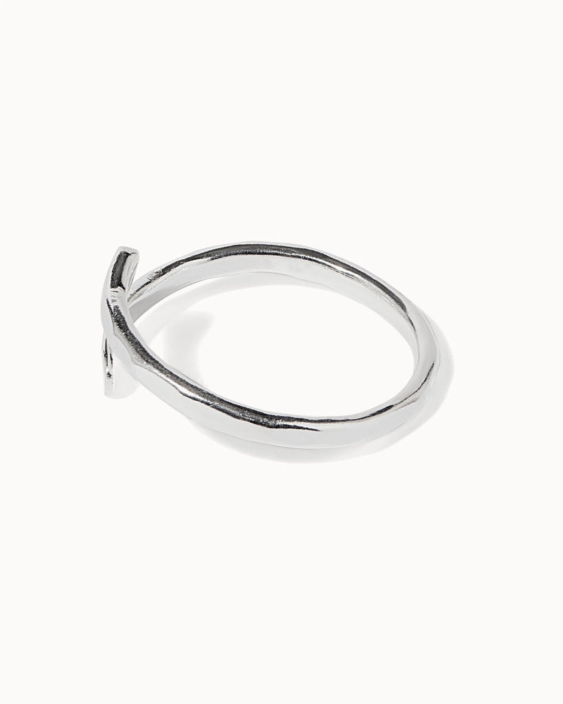 Sculptural adjustable ring in sterling silver with hammered finish handcrafted in London by Maya Magal London