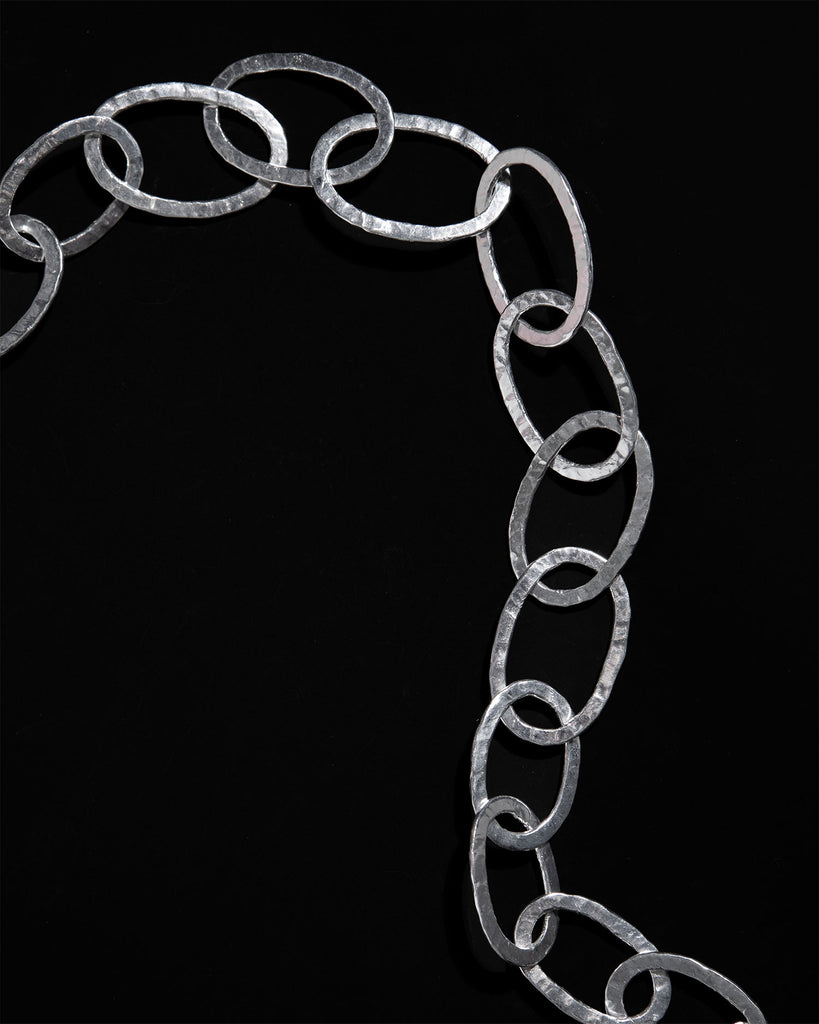 Oversized statement chain necklace with hammered texture Handcrafted in sterling silver in London by Maya Magal London