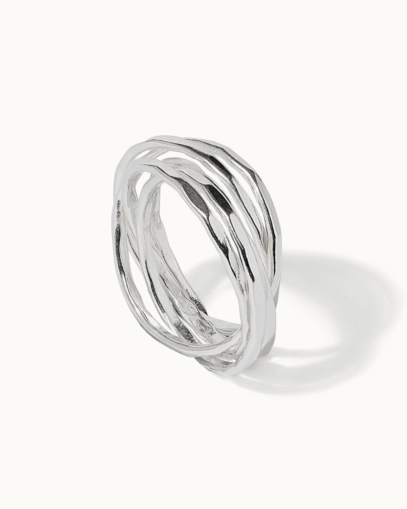 sterling silver interlocking rings with hammered texture handcrafted in London by Maya Magal London