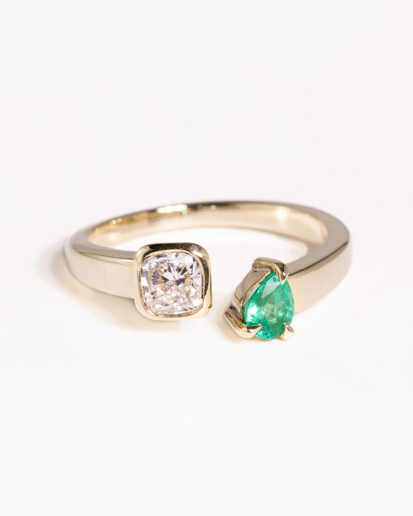 toi et moi ring with 0.36ct lab grown diamond and pear cut emerald handcrafted in London by Maya Magal London