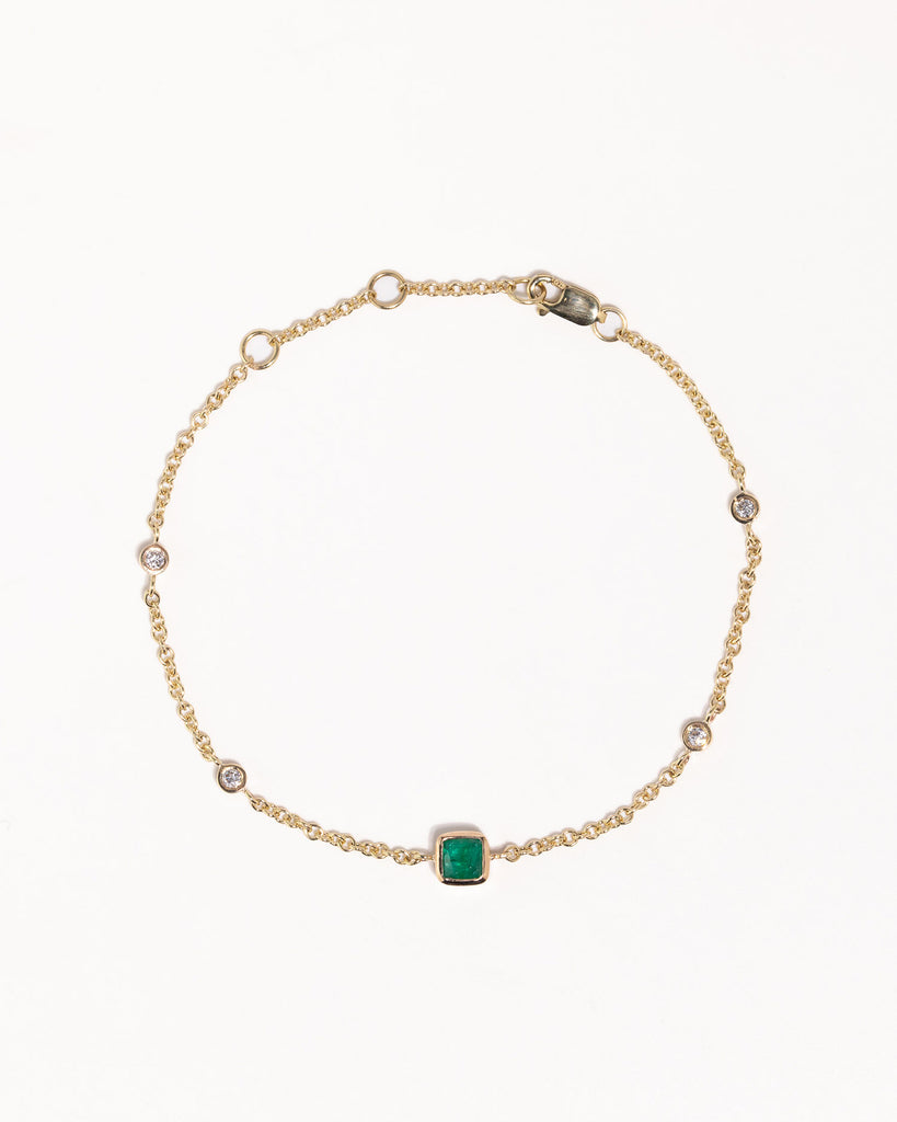 recycled 9ct solid gold bracelet with lab grown diamonds and cushion cut emerald handcrafted in London by Maya Magal London