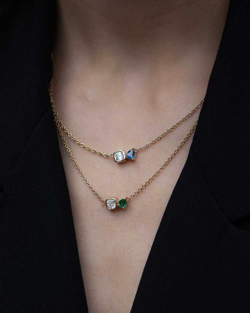 toi et moi necklace with 0.36ct lab grown diamond and pear cut emerald. Handcrafted in London by Maya Magal London