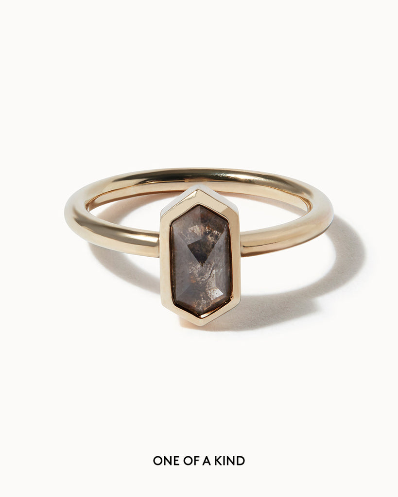 hexagon cut grey diamond in a  polished 9ct recycled yellow gold setting handcrafted in London by Maya Magal