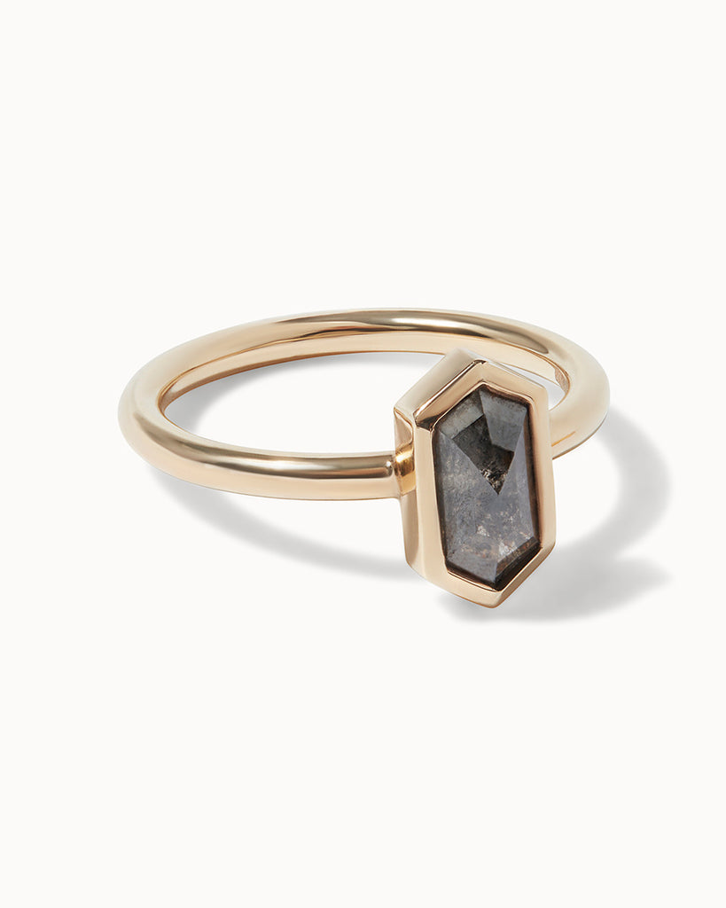 hexagon cut grey diamond in a polished 9ct recycled yellow gold setting handcrafted in London by Maya Magal