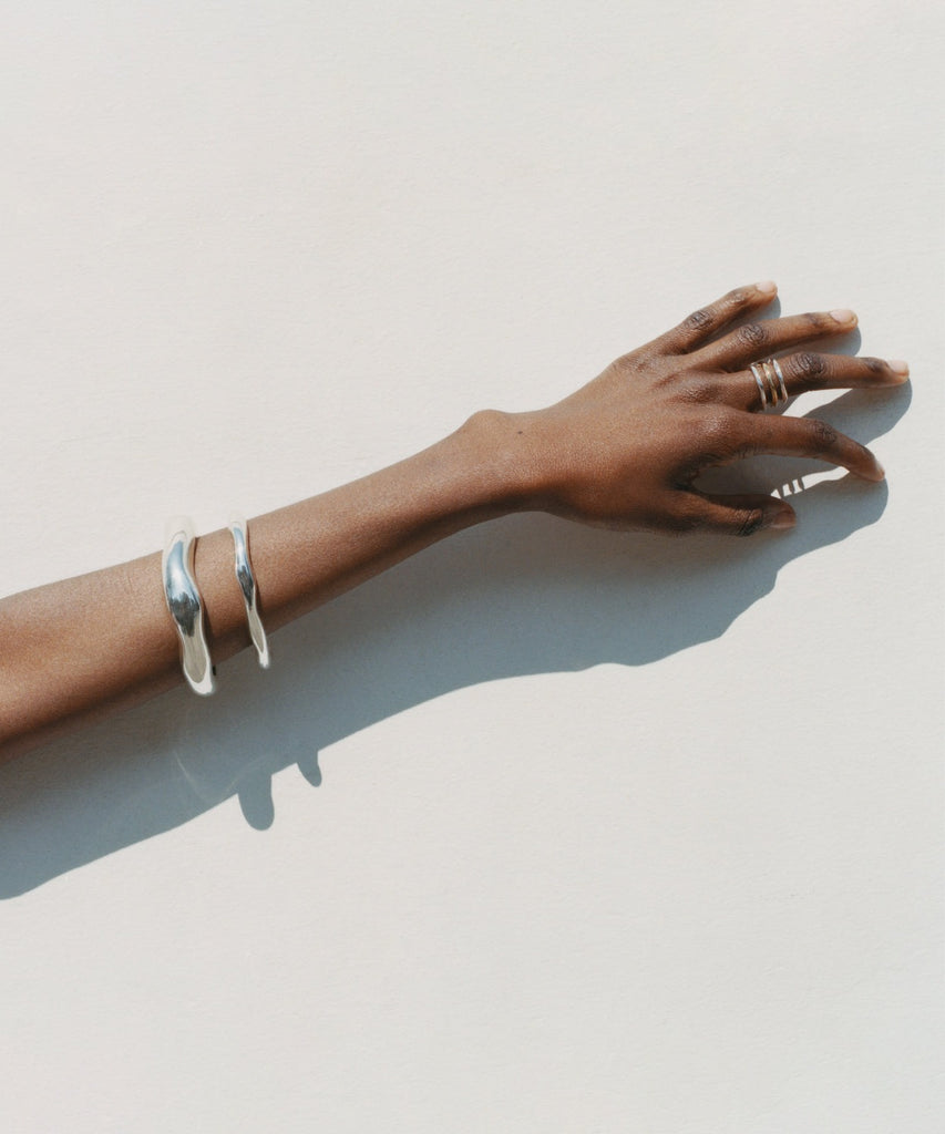 Lucid Bangle Paired with Lava Stripe Ring handmade in sterling silver in the Maya Magal London jewellery workshops
