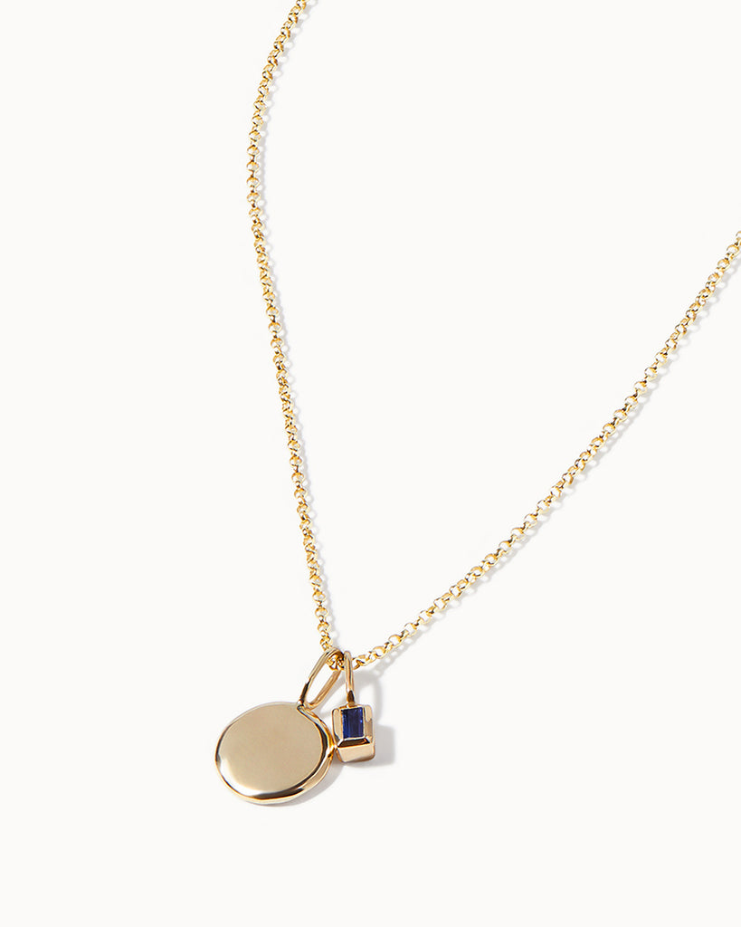 9ct Solid Gold Sapphire and Circle Charm Necklace handmade in London by Maya Magal sustainable jewellery brand